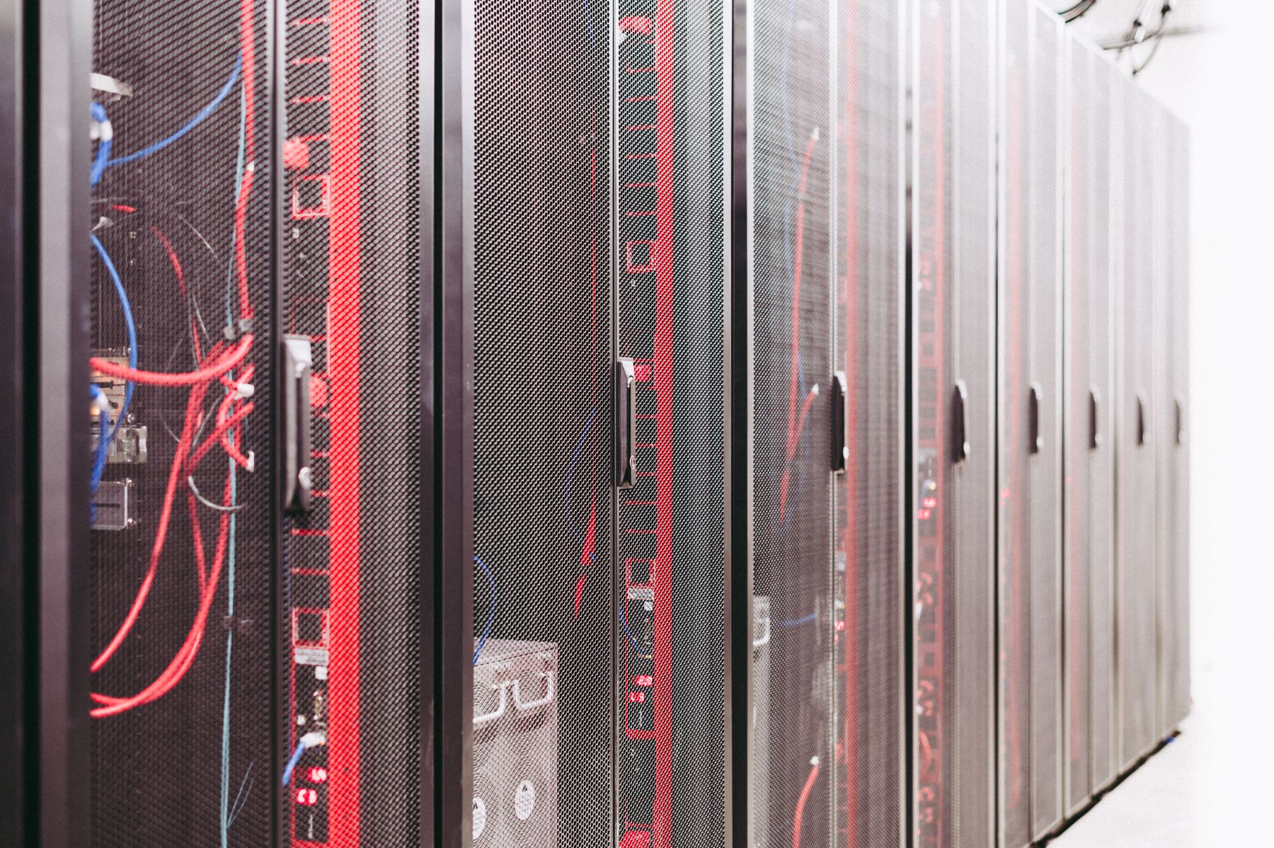 Rows of secured equipment racks in a data centre
